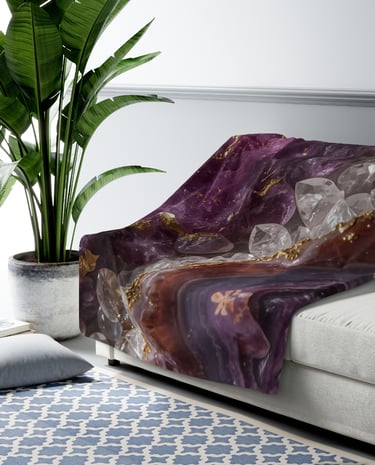 a purple blanket on a settee