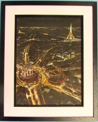 A dramatic aerial view of Paris at night with lights linking Arc De Triomphe and Eifel Tower.