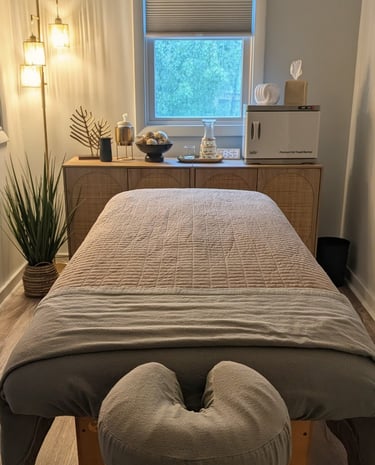 a massage table with a hot towel warmer