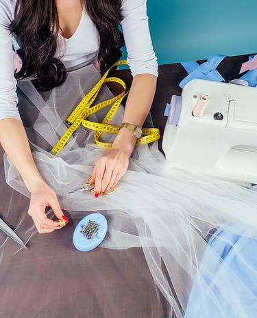 a woman working with the sewing machine