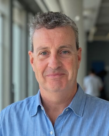 a man in a blue shirt and a blue shirt