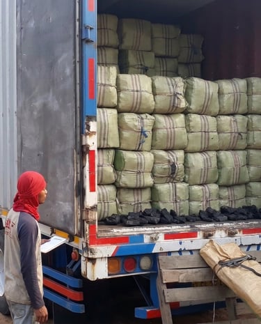 The process of loading dried gracilaria seaweed into containers for delivery to export buyers.