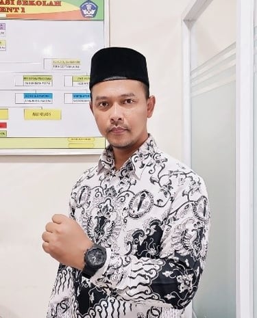 Darul Arkom, M.Pd