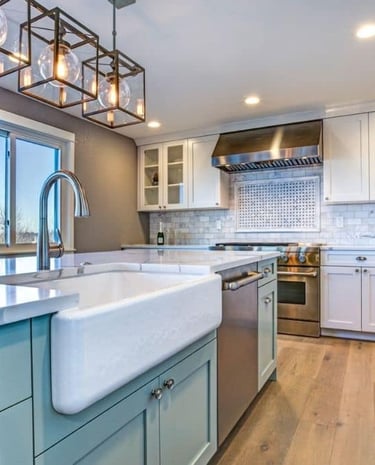 a kitchen with a sink and a large window, finished kitchen remodel