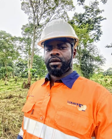 a man in a hard hat and safety vest