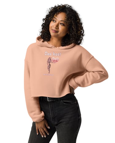 a woman wearing a pink hoodie with a tribal woman print front view