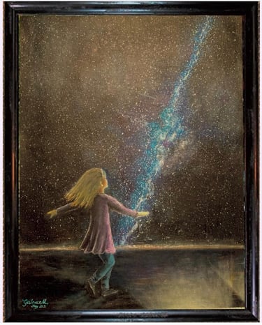 A young girl admiring Milky Way in the desert