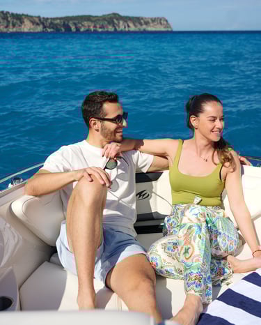 Couple enjoying a private boat trip from Alcudia