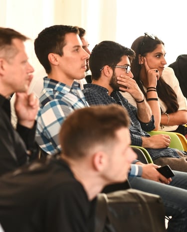 young attendees to conference listening with attention