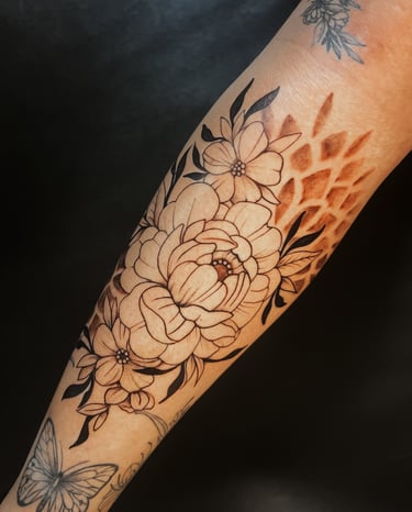 fine line floral tattoo