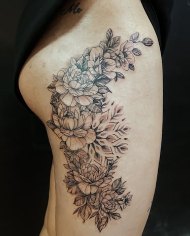 fine line flower tattoo