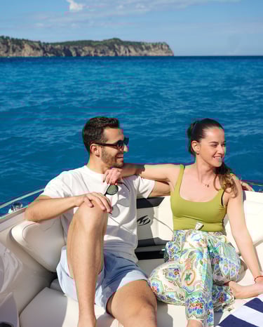 Couple enjoying a private boat trip from Alcudia