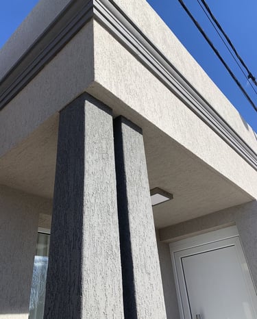 Casa con revestimiento texturado A llana