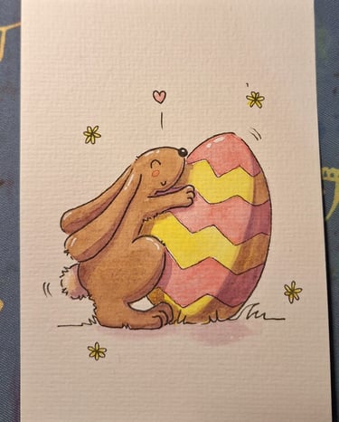 carte illustrée à l'aquarelle : mignon lapin de pâques et son œuf géant