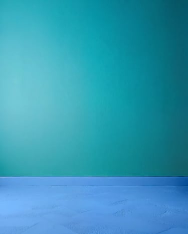 recorte sem objetos que mostra uma parede pintada em verde, terminando no chão pintado de azul.