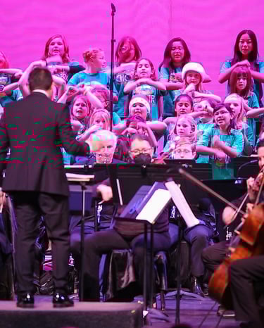 CREATE hosts a holiday children's choir program to help educate children in music.