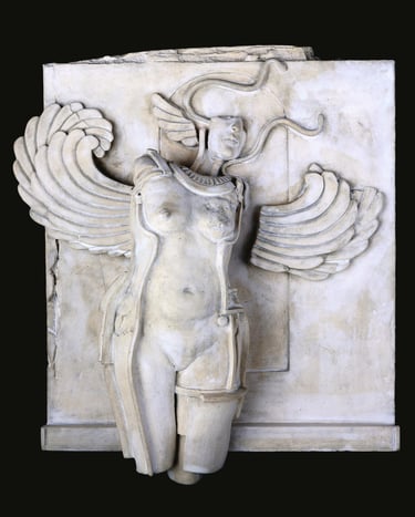Small ceramic wall sculpture of a nude woman with wings and snakes, in a classical style.