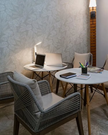 a table with a laptop and a laptop on it