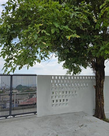 Kuari21 event space secondary entrance with big tree