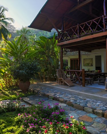 a hotel with a stone patio in villavicencio