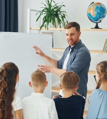 Experienced faculty guiding students in a classroom session