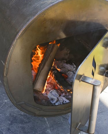 fire inside a rawsteelco Offset smoker that was built in nz