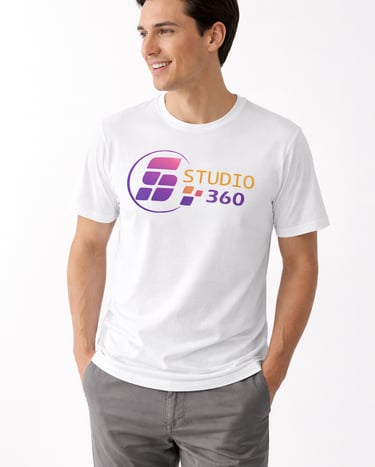 A smiling man wearing a white custom branded t-shirt featuring the Studio 360 graphic logo.