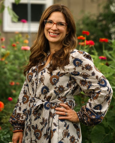 Julie Picchiotti Smiling in Front of Her Cut Flower Garden