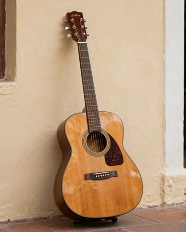 A detailed shot of an acoustic guitar leaning against a textured wall in a Venezuelan colonial-style patio. The lighting is warm cream, reflecting a soulful and authentic musical journey.