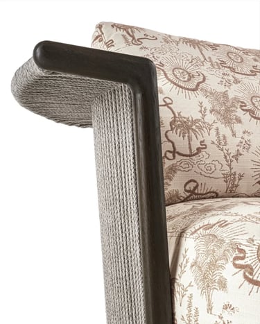 Comfortable outdoor seating with patterned cushions, natural textures and lounge chair design for re