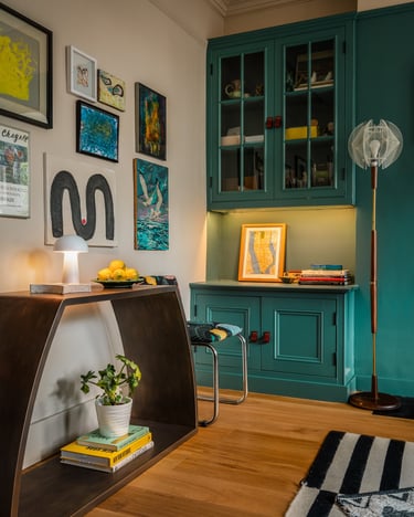 Unity Console Table displayed in Amy Tsao's home office and with gallery wall above
