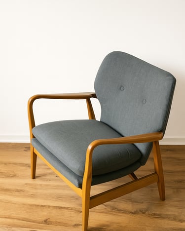 Light grey mid-century wooden armchair with fabric seat