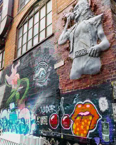 a wall mural of a man on a wall