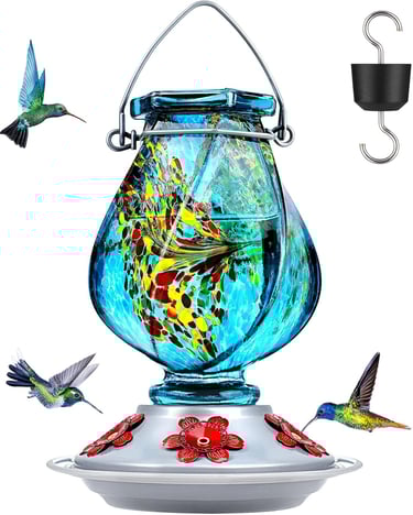 Hand-blown blue glass hummingbird feeder with colorful accents and red flower feeding ports.