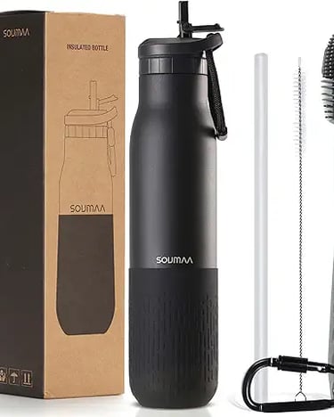 a bottle of water and a brush in a box