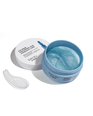 a container of blue geling cream with a spoon and spoon