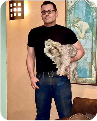 Photo of J. Elton Marks, the artist with his best friend Sparky, the Yorkshire Terrier