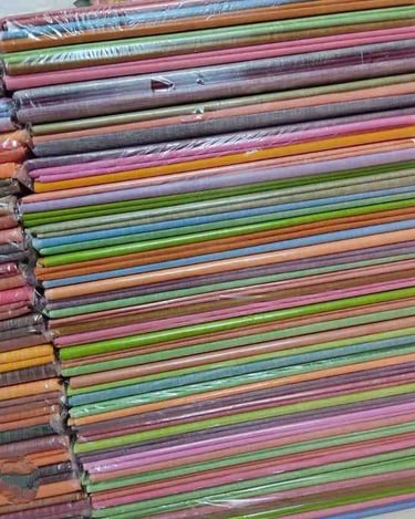 Assorted Colored Mulberry Silk Fabrics Rolled in Bundles – Ready for Weaving and Export from India