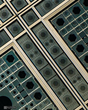 Adjustable façade lenses of the Institut du Monde Arabe shimmering in daylight, inspired by Arabic geometry.