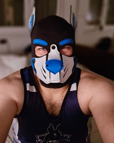 Man in a pup mask.