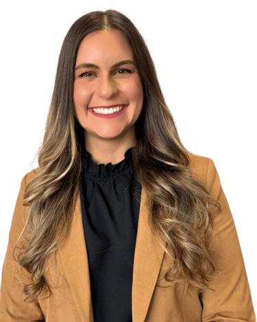 woman wearing a suit with a black shirt and long hair
