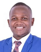 a man in a blue suit and tie