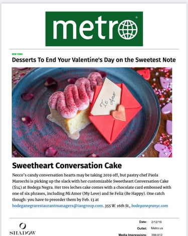 a dessert with a heart shaped cake on a plate