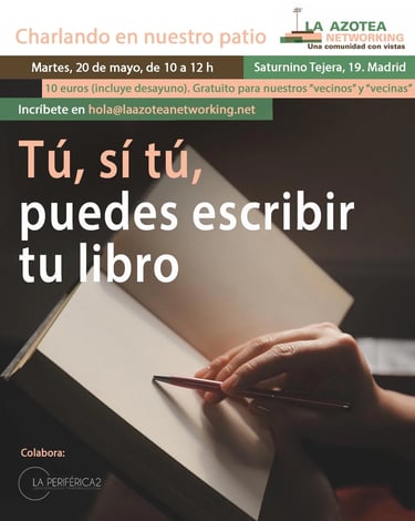 a person holding a pen and writing on a book