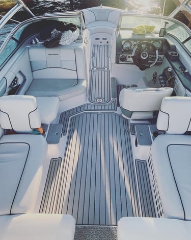 Boat interior upgraded with custom grey SeaDek flooring installed by Vital Marine in Ontario