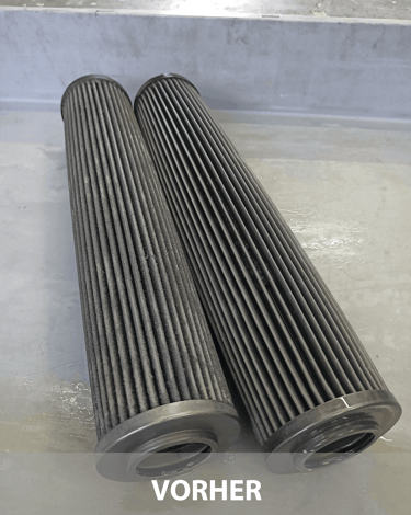  Zwei verschmutzte und verstopfte Hydraulikfilter vor der professionellen Filterreinigung.