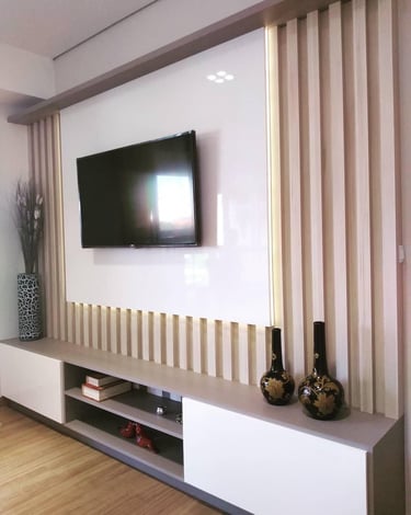 a tv screen mounted on a wall mounted on a wall