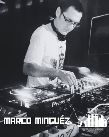 a man in a white shirt and headphones playing music