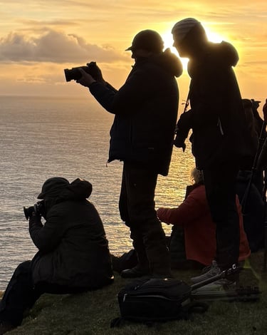 silhouettes of photographers in the Faroe Islands