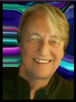 a man with blonde hair and a black shirt